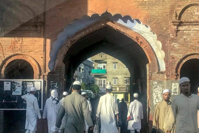 Students going to a mosque for evening prayers at Darul Uloom in Deoband