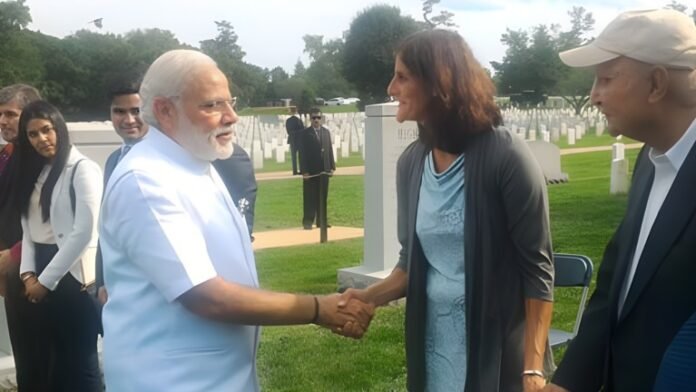 narendra Modi shaking hand with sunita williams