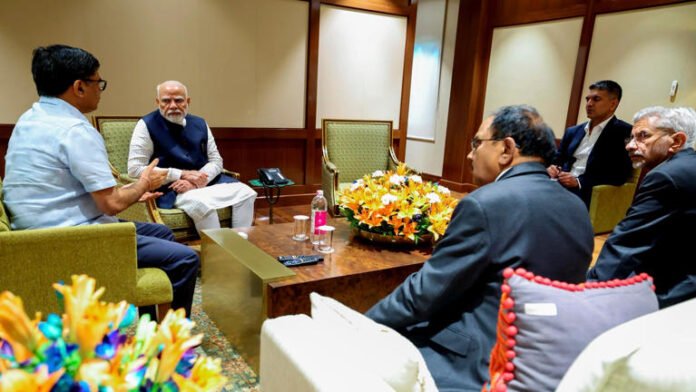 PM Modi with other officials in a meeting