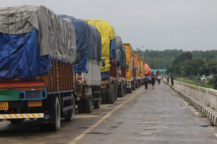 Cargo trucks moving through an India-Myanmar border trade checkpost in Northeast India