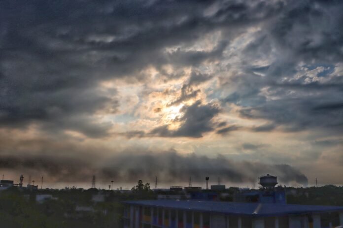 Dark storm clouds and heavy rainfall over Northeast India during IMD severe weather alert
