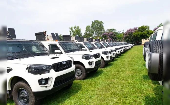 Official vehicles traveling in a streamlined government convoy under new administrative guidelines in Manipur