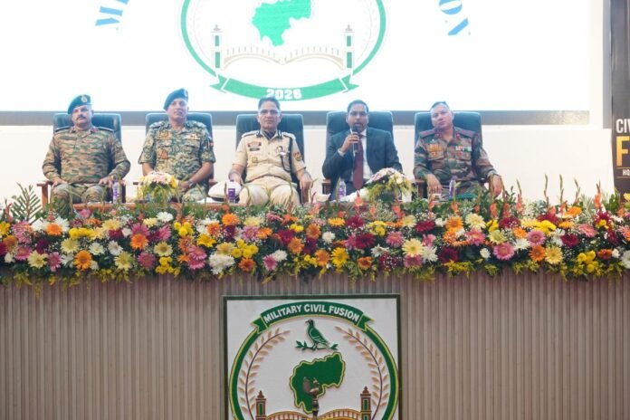 Officials and defence representatives participating in a military-civil cooperation seminar in Agartala discussing coordinated governance initiatives