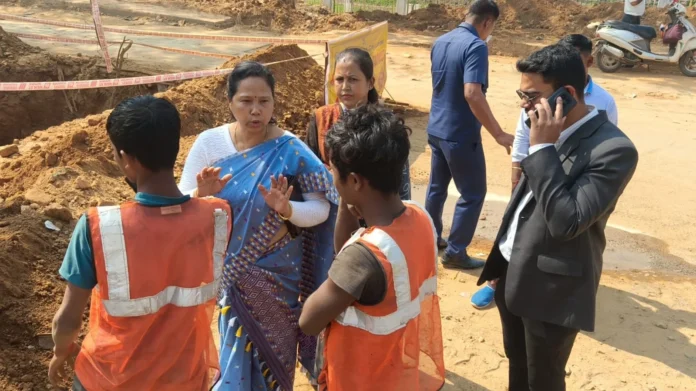 Administrative officials rescuing child from forced begging near North Gate area in Agartala.