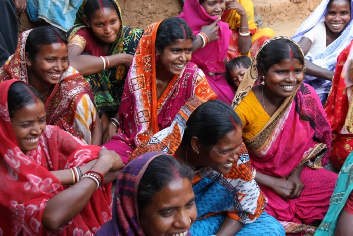 Women members of self-help groups managing small enterprises supported by credit flows and government subsidies in rural areas.