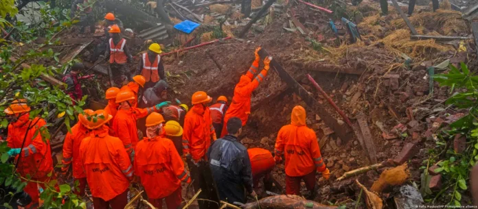 Rescue personnel at the site of the Migging Landslide Accident Tragedy after a vehicle plunged down a steep mountainside following a landslide.