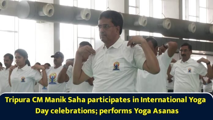 Chief Minister Dr. Manik Saha participating in a mass yoga session during the state-level International Yoga Day celebrations at Hapania.