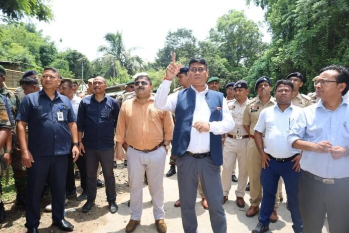 Tripura Tribal Welfare Minister Bikash Debbarma addresses a meeting as discussions lead to the withdrawal of a planned rail and road blockade.