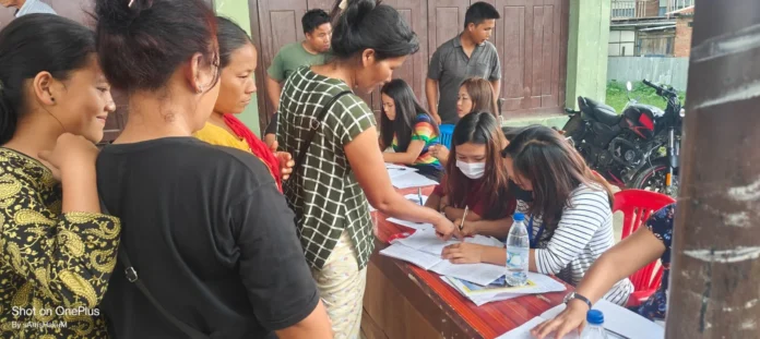 Healthcare workers providing medical assistance at a permanent aid camp set up in a remote hill district of Manipur.