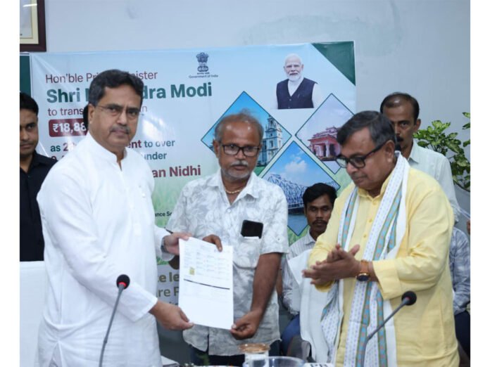 Tripura Chief Minister Dr. Manik Saha participating in the 23rd PM-KISAN installment fund transfer ceremony while highlighting ₹529 crore assistance to farmers.