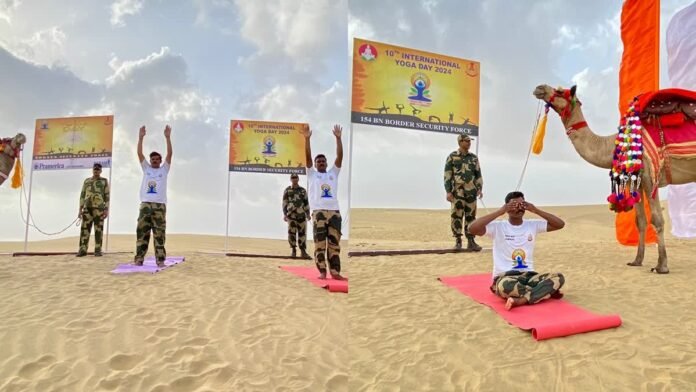 BSF personnel of the 114 Battalion performing yoga and fitness exercises on the Indo-Bangla Maitri Bridge in Sabroom during International Yoga Day celebrations.