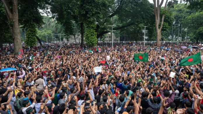 Members of the Amra Bangali organization participating in a Black Day observance in Agartala while demanding justice related to the 1980 violence in Tripura.