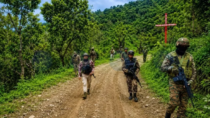 Security personnel participating in a large-scale search operation in Kangpokpi district that led to the recovery of the mortal remains of six Naga men.