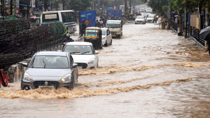 Workers upgrade a major stormwater drainage channel in Guwahati as part of Assam's initiative to reduce flash flooding during the monsoon season.