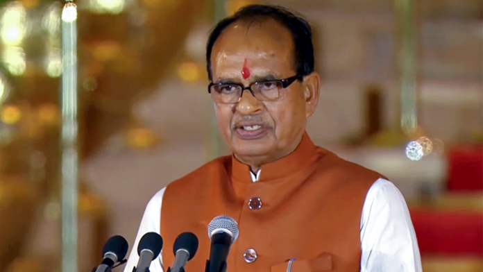 Union Agriculture Minister Shivraj Singh Chouhan chairing a high-level agricultural recovery meeting in Guwahati with officials reviewing flood-affected crop sectors.