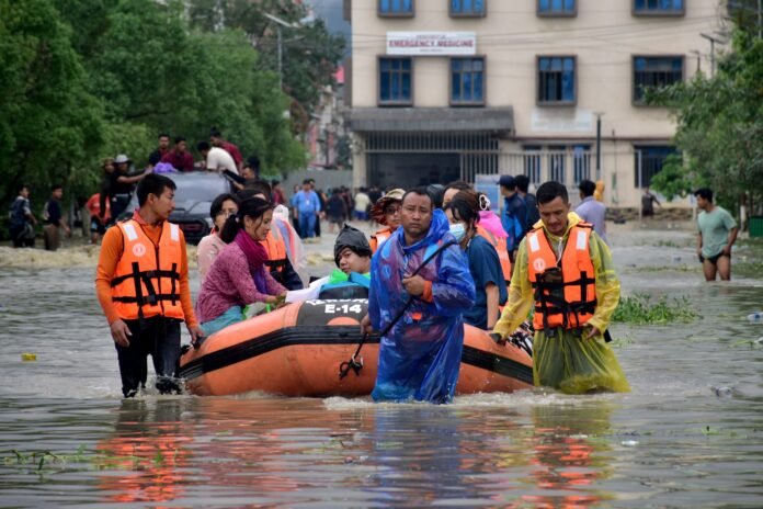 Flood-affected area in Northeast India where relief teams assess damage following severe flash floods.