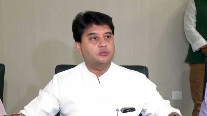 Union Minister Jyotiraditya Scindia conducting telephonic reviews with northeastern state officials regarding flood preparedness and emergency response.