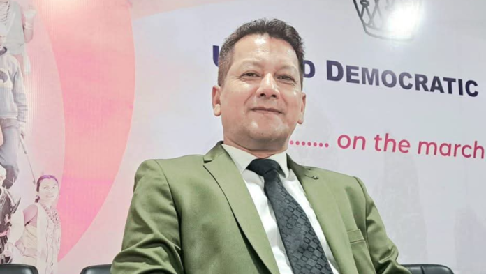 Former UDP leader Jemino Mawthoh addresses a gathering of party workers at a political event in Shillong.