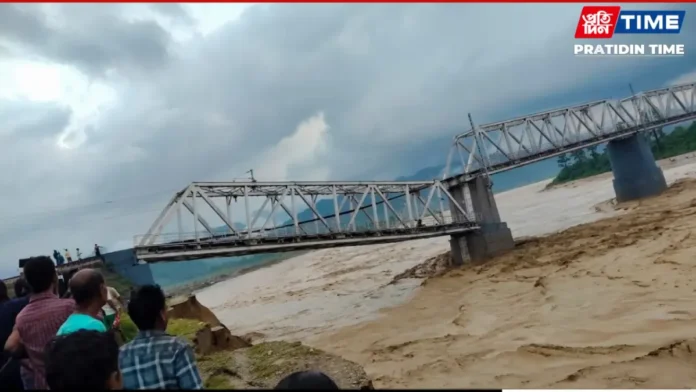 Railway tracks near a riverbank in Assam's Dhemaji district as engineers inspect erosion damage following the suspension of train services.