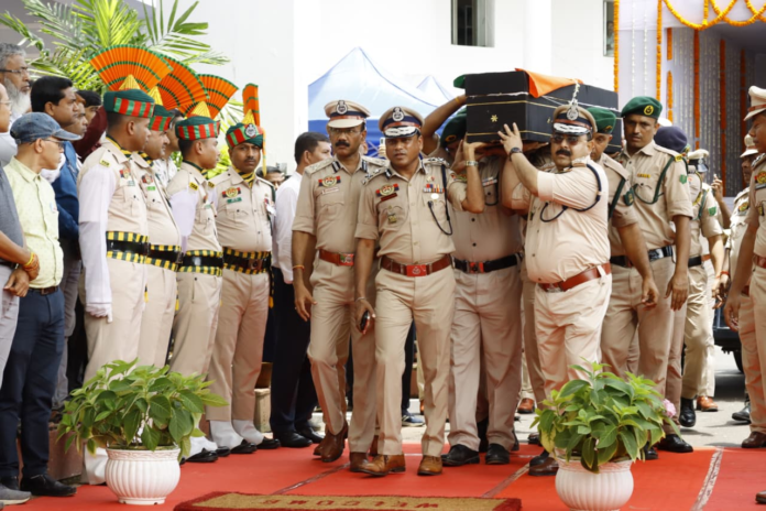 The Governor and Chief Minister Manik Saha place wreaths during a tribute ceremony at the Civil Secretariat following the death of Director General of Police Anurag Dhankar.