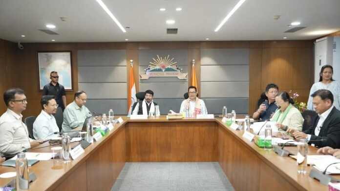 Local government officials and community representatives in Assam and Arunachal Pradesh participate in a governance and rural development meeting.