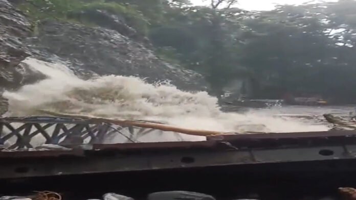 The collapsed Bailey bridge over the Phee Khola in Sikkim following flash floods that isolated the Dzongu region.