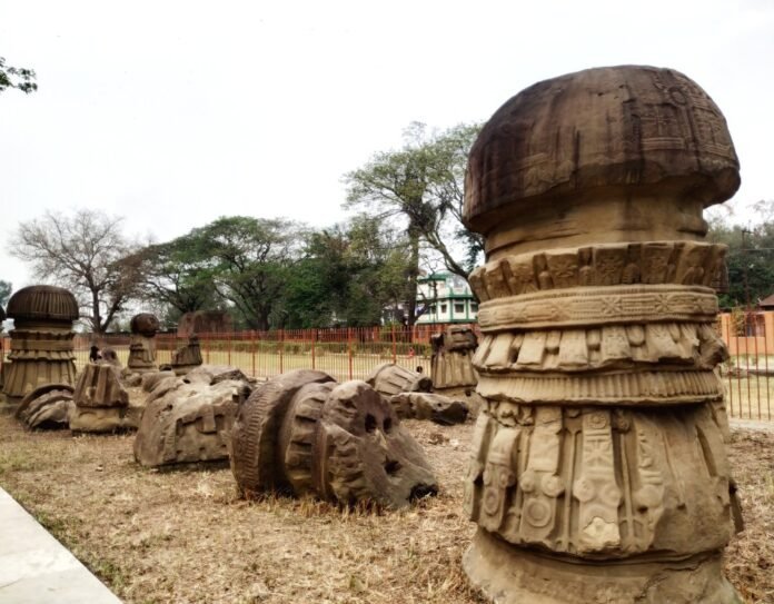 Youth volunteers clean the historic Kachari ruins in Dimapur as part of a community heritage preservation initiative.
