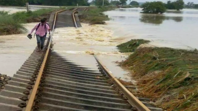 Northeast Frontier Railway clears debris from an affected railway section to restore critical connectivity in the Northeast.