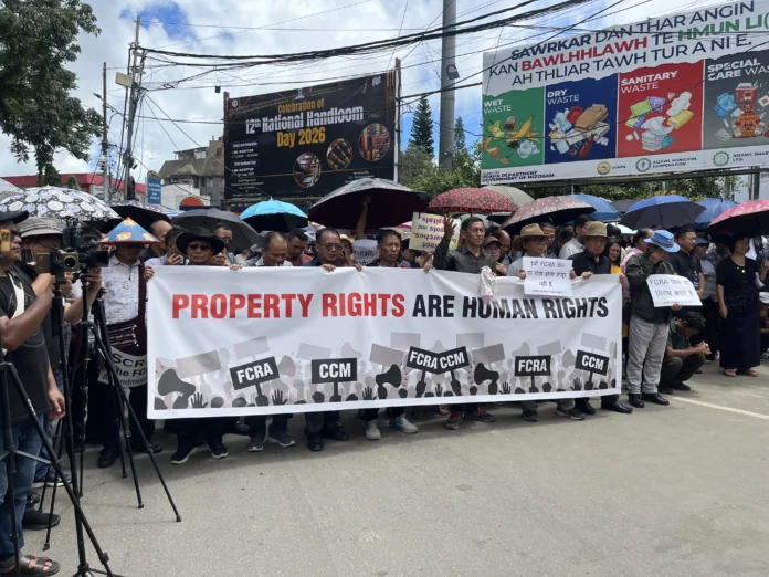Church and civil society members prepare for a public march in Aizawl opposing proposed amendments to the Foreign Contribution Regulation Act.
