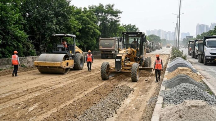 The Noida Authority has launched a Rs 34 crore redevelopment project for Yamuna Pushta Road, aiming to upgrade the key stretch and improve connectivity, traffic movement and overall infrastructure in the area. The redevelopment initiative is part of the authority's broader efforts to strengthen urban infrastructure and improve road conditions across Noida. The project is expected to address existing infrastructure requirements while creating a more efficient and better-maintained road corridor. Once completed, the upgraded Yamuna Pushta Road is expected to benefit commuters and residents by improving travel conditions and easing movement along the important route. Rs 34 Crore Redevelopment Project Launched The Noida Authority has initiated the redevelopment of Yamuna Pushta Road with an estimated investment of Rs 34 crore. The project is expected to involve comprehensive improvement of the road and associated infrastructure. The redevelopment aims to enhance the condition of the corridor and improve its ability to handle traffic. Road improvement projects are an important component of Noida's continuing urban development, particularly as the city experiences increasing traffic and expansion. The investment in Yamuna Pushta Road reflects the authority's focus on improving key stretches that serve residential areas, commercial zones and other parts of the city. Focus on Better Connectivity and Traffic Movement Improving connectivity is expected to be one of the major objectives of the Yamuna Pushta Road redevelopment. The upgraded corridor could help improve the movement of vehicles and provide a smoother travel experience for daily commuters. Infrastructure improvements may also help address issues related to road conditions and traffic management. The Noida Authority is expected to carry out the redevelopment work in accordance with the approved project plan, with attention likely to be given to improving the overall quality and durability of the road. The development of better road infrastructure can also contribute to reducing travel time and improving access between different parts of the city. Project Part of Noida's Infrastructure Push The redevelopment of Yamuna Pushta Road comes as Noida continues to focus on strengthening its infrastructure to meet the needs of a growing urban population. The Noida Authority has been undertaking development and maintenance projects involving roads, public facilities and other urban infrastructure. Improved road networks are considered important for supporting residential growth, business activity and economic development. The Rs 34 crore project is expected to contribute to this broader infrastructure expansion by upgrading an important route and improving conditions for those who use it regularly. Benefits Expected for Residents and Commuters Residents and commuters are expected to benefit from the redevelopment once the work is completed. Improved road infrastructure could provide smoother travel conditions and strengthen connectivity with nearby areas. The project may also support better traffic flow, particularly if the redevelopment includes associated improvements designed to manage vehicle movement more effectively. During the construction period, however, commuters may experience temporary disruptions depending on the manner in which the work is carried out. The authority is expected to coordinate the project to minimise inconvenience while ensuring that the redevelopment is completed according to required standards. Urban Infrastructure Remains Key Priority Road redevelopment continues to be an important aspect of urban planning in rapidly growing cities such as Noida. As traffic volumes increase, authorities face the challenge of maintaining existing infrastructure while developing new facilities to meet future requirements. Projects such as the redevelopment of Yamuna Pushta Road aim to improve the quality of existing infrastructure and support the city's growing connectivity needs. The investment could also contribute to improved mobility and accessibility for residents and businesses located near the corridor. Noida Strengthens Focus on Road Development With the launch of the Rs 34 crore redevelopment project, the Noida Authority has taken another step towards upgrading the city's road infrastructure. The project is expected to improve the condition and capacity of Yamuna Pushta Road while supporting smoother traffic movement and better connectivity. The progress of the redevelopment will be closely watched by residents and daily commuters who rely on the route. Once completed, the upgraded road is expected to contribute to Noida's wider infrastructure network and support the city's continuing urban growth. The Noida Authority's investment in Yamuna Pushta Road reflects its broader focus on developing and modernising key infrastructure to meet the requirements of a rapidly expanding city.