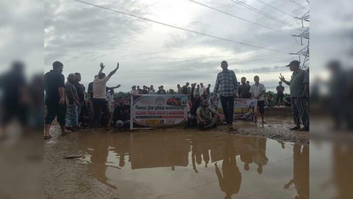 tension along assam-mizoram border as truckers block highway over alleged harassment
