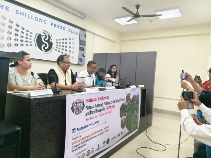 Agricultural experts and students participating in a national conference on natural farming and sustainable agriculture at a postgraduate agricultural college.