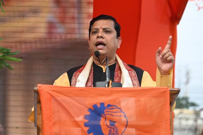 Tripura Labour Minister Tinku Roy participating in a national labour conference and discussing stronger worker protection and labour database systems.